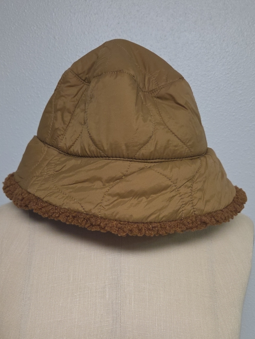 Steve Madden Quilted Tan Bucket Hat with Brown Sherpa Trim